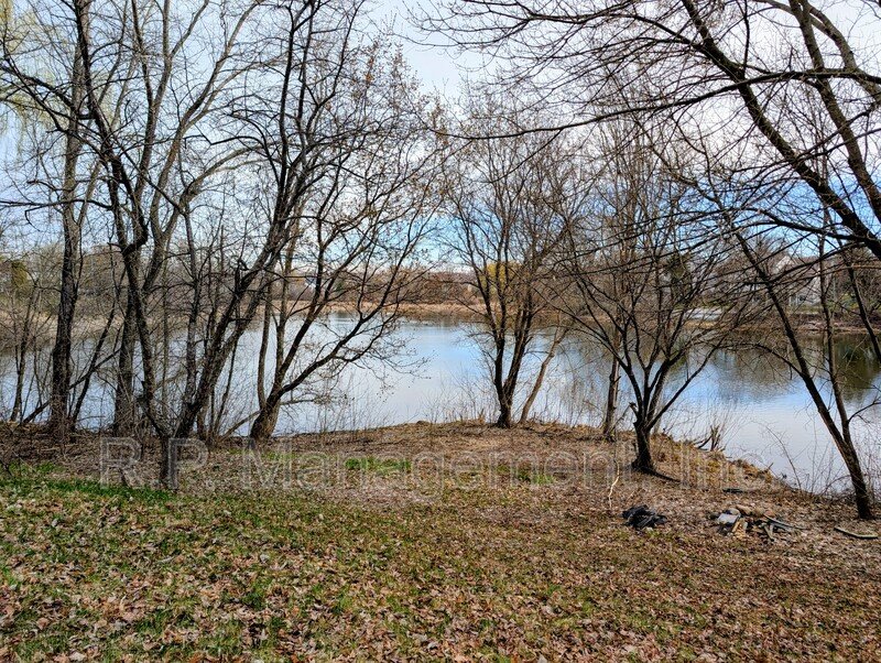 Large 4 bedroom 3 bath home with 180' views of your backyard lake property image